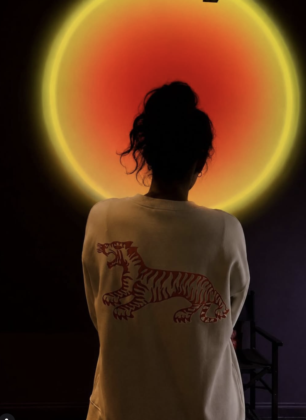 BRAT tiger on a studio member’s shirt